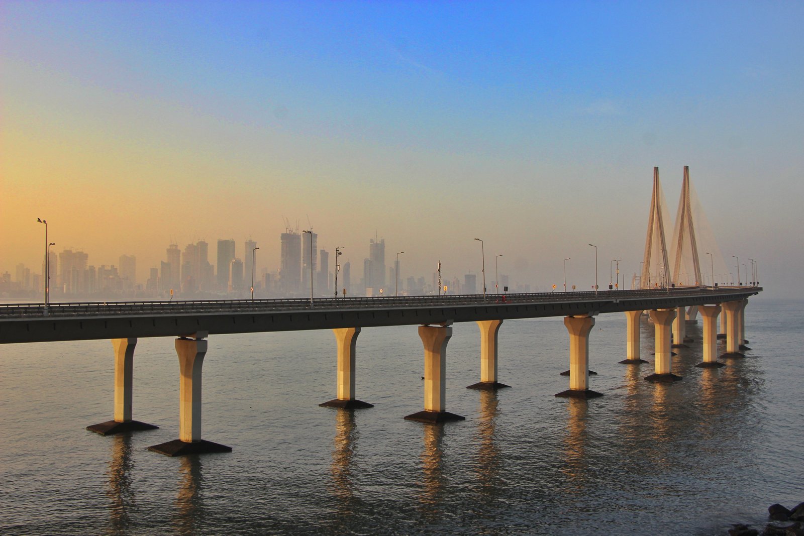 Mumbai skyline Bandra - Worli Sea Link bridge with fishing boats view from Bandra fort. Mumbai, Maharashtra, India